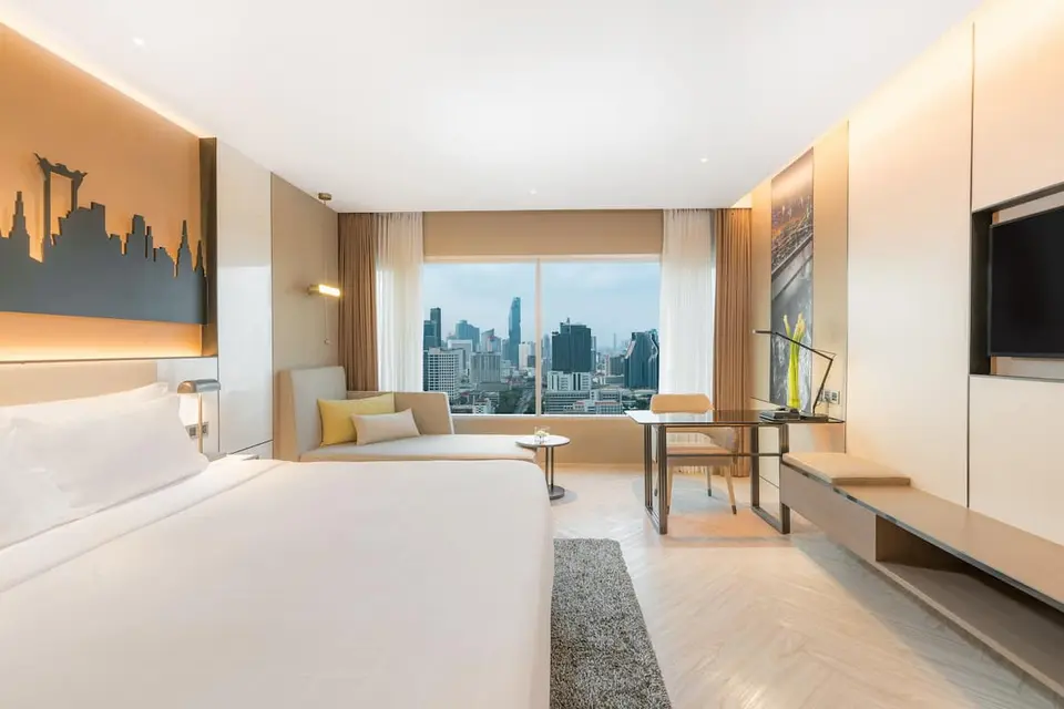 Opdag din indkvartering med udsigt over byen på Pathumwan Princess Hotel. Nyd et fredfyldt og komfortabelt hotelværelse med store vinduer,